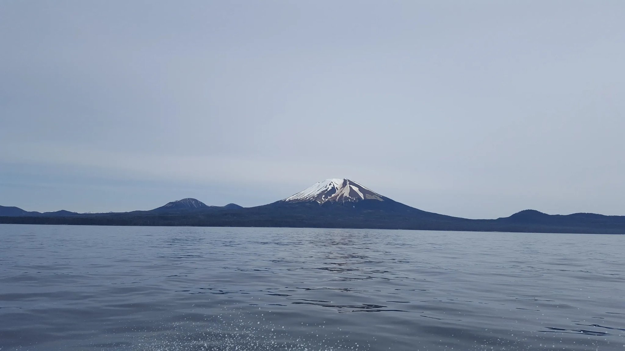 Mt. Edgecumbe volcano rising above the calm waters of Sitka Sound